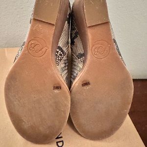 Lucky brand, sneak print ankle booties. Size 6.5 with a wedge heel and zipper